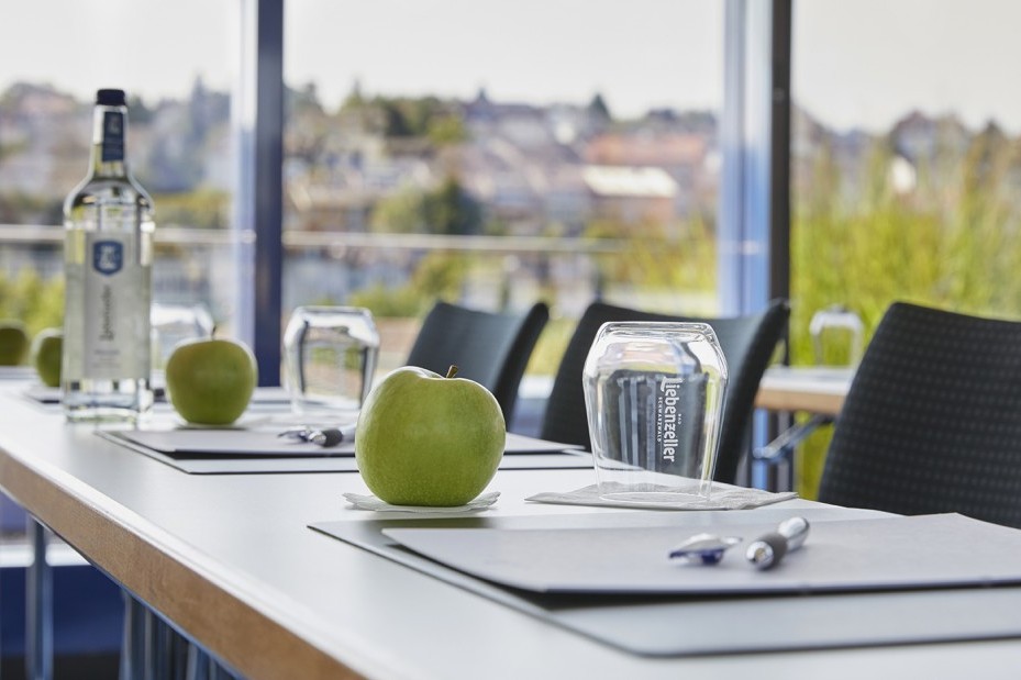 Tagungs Schreibmaterial mit einen grünen Apfel